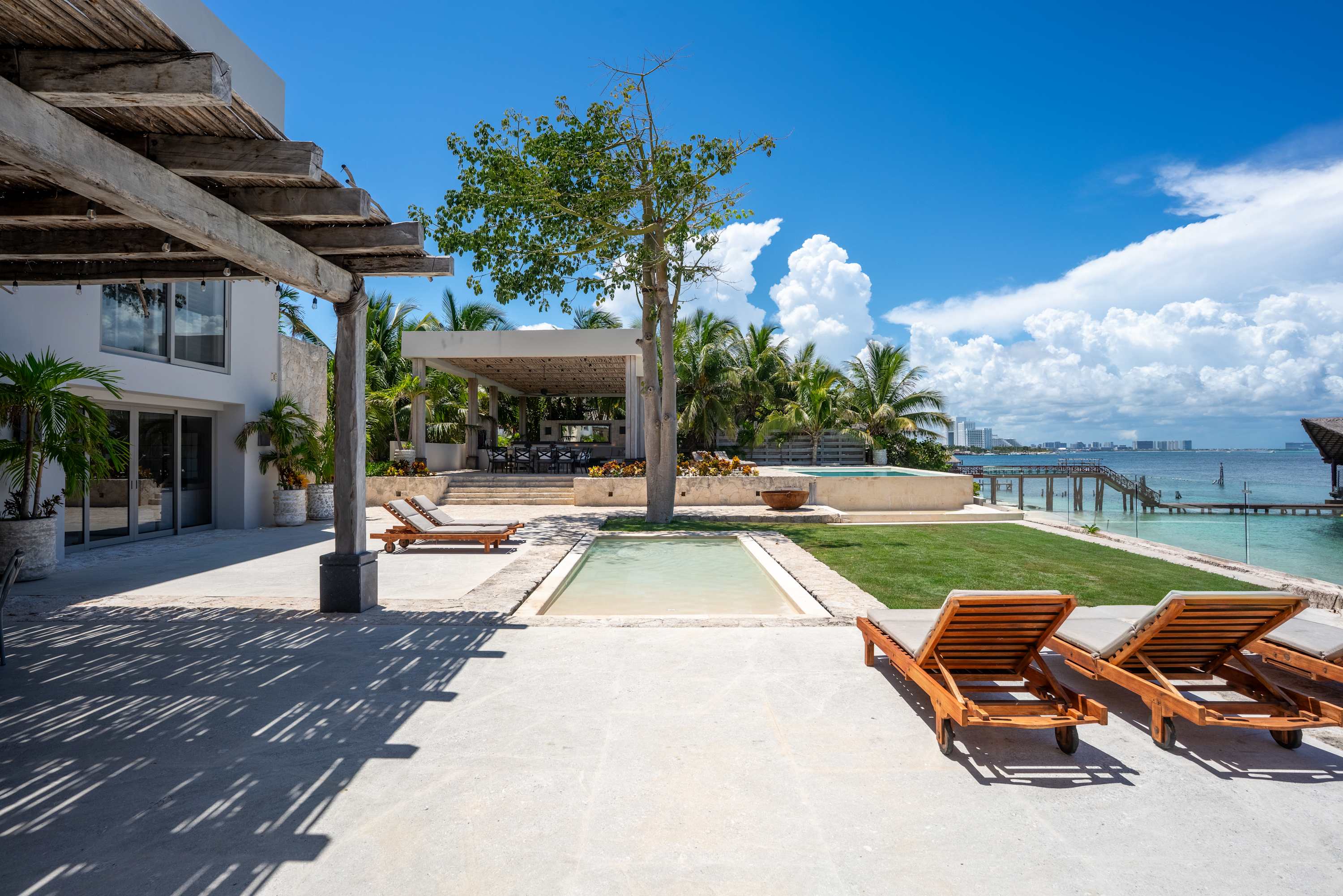 Luxury villa with pool and ocean view.