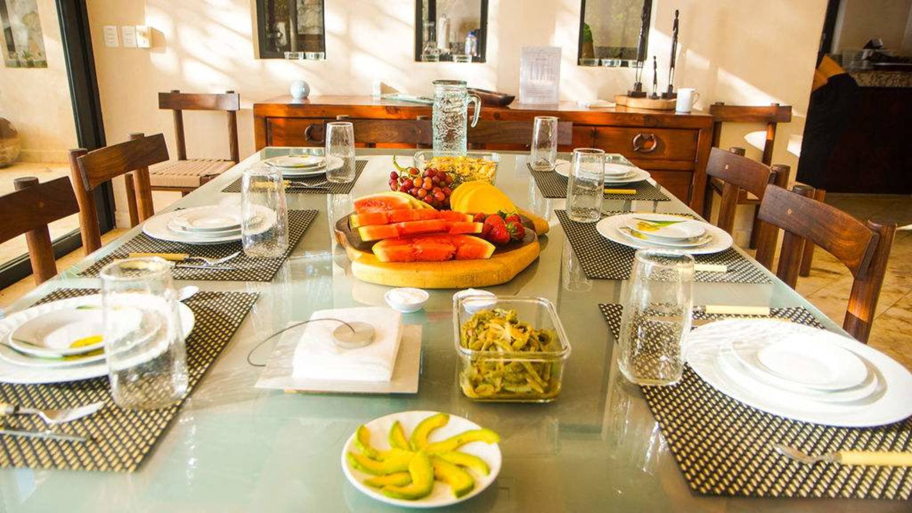 a table setting with food and drinks.