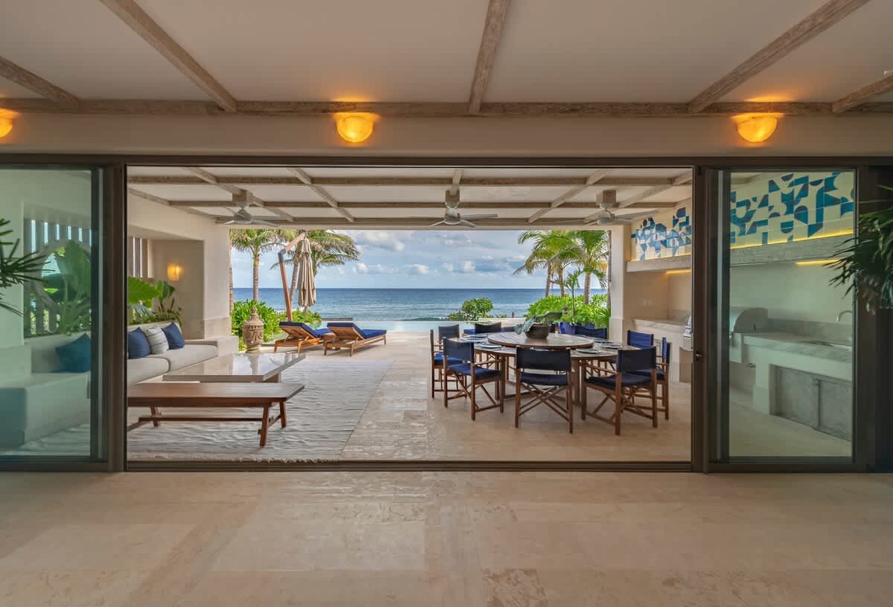 Luxury outdoor living space with ocean view.