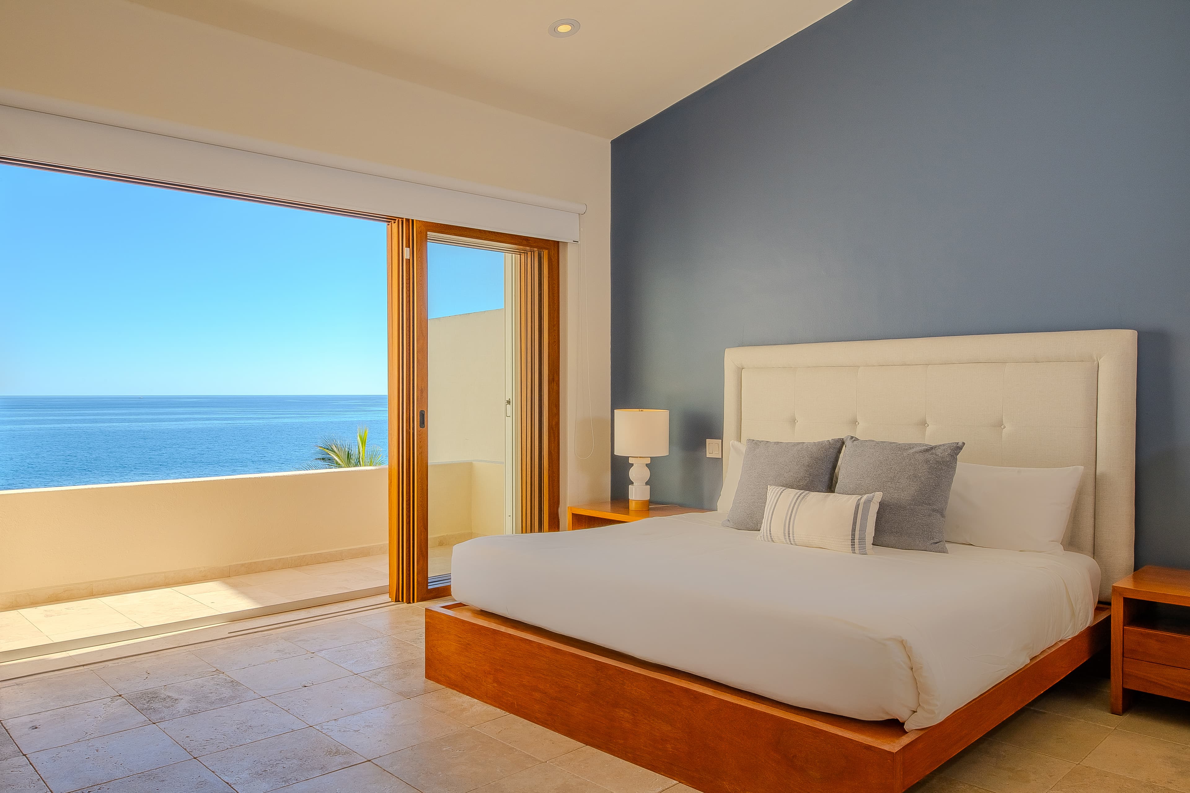 Bedroom 2 · Wake up to stunning ocean views from your elegant bedroom, where a plush king bed and serene coastal palette invite total relaxation and restful nights.