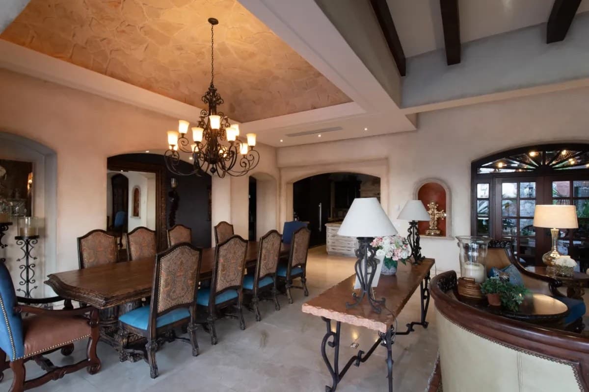 Step into your private dining retreat where vaulted ceilings and elegant archways create an unforgettable gathering space for memorable meals with loved ones.