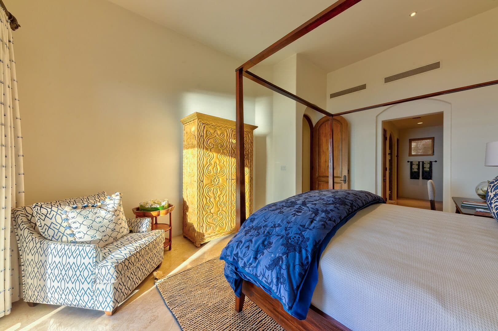 View of the closet and bathroom door of bedroom one in this Los Cabos villa.